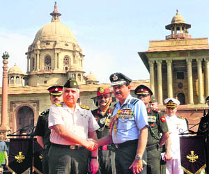 Gen Necdet Ozel, Commander of the Turkish Armed Forces, with Air Chief Marshal NAK Browne as he arrives to review a guard of honour at South Block in New Delhi on Wednesday. Ozel is on a three-day visit to India. 