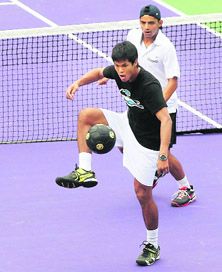 Somdev Devvarman and Sanam Singh play around on Wednesday. 