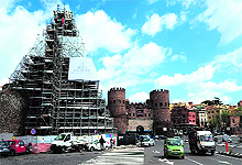 The Pyramid of Cestius covered with scaffolding in Rome. Japanese businessman Yuzo Yagi is investing $1.3 million to restore the 2,000-year-old Roman pyramid