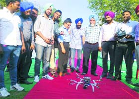 Small wonder: Students and faculty members of the PTU GZS campus with an aerocort developed by a college student Harsimran Singh