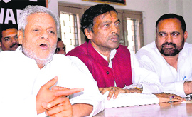 UP Cabinet Minister Rajendra Chaudhary, along with state leader Vinod Barthwal, in Haridwar on Thursday. 