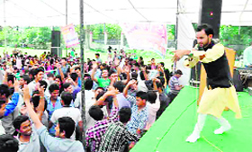 A Jaunsari singer performs at the students week programme at SGRR PG College in Dehradun on Thursday.
