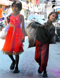 Deprived of school education, two girls work as rag-pickers in Jalandhar. 
