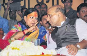 Rajasthan BJP president Vasundhara Raje with party chief Rajanath Singh at Charbhuja on Thursday
