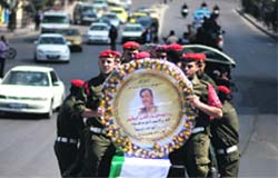 Members of Hamas security forces during a symbolic funeral of Maisara Abu Hamdiyeh in Gaza City on Thursday.  Reuters