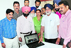 Punjab Education Minister Sikandar Singh Maluka launches the new-look website of the District Education Office in Bathinda on Friday