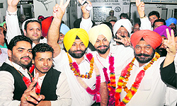 Parminder Singh Toor (president), Ranjodh Singh Sarao (secretary), Gurpreet Singh Bagri (vice-president) and Sunil Kumar Prashar (treasurer) in a jubilant mood after winning the District Bar Association elections in Mohali on Friday
