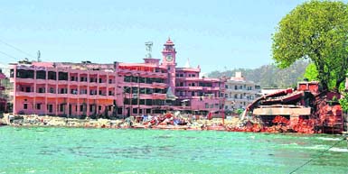 The Ganga ghat, Haridwar, where a portion of an illegal temple-cum-ashram was demolished following an HC directive. Tribune photo: Rameshwar Gaur