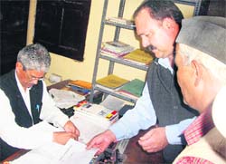Probable candidates for the MC election clear their dues in the SDMs office in Mussoorie. 