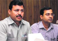Dinesh Dhanai, Chairman, GMVN, addresses a press conference in Dehradun on Friday. Tribune photo: Vinod Pundir