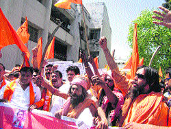 Activists of the Shiv Sena protest in front of the DMs office in Dehradun on Friday.