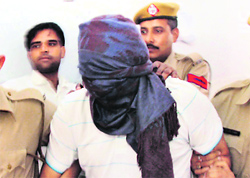 Anil Kumar being produced in a Gurgaon court on Friday.
