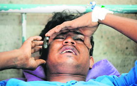 An injured person talks to his family from a hospital