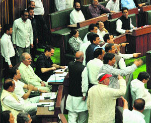 Opposition members staged a walkout in protest against back-door appointments in government departments in the Assembly on Friday. 