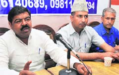 Mohammad Afzal, National Convenor of Muslim Rashtriya Manch (MRM), addresses a press conference at Press Club in Jammu on Friday. Tribune Photo: Inderjeet Singh