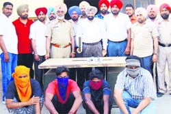 The accused in police custody in Jagraon on Friday. A Tribune photograph 