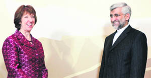 Iran's chief negotiator Saeed Jalili (R) and European Union Foreign Policy chief Catherine Ashton before talks in Almaty on Friday. 