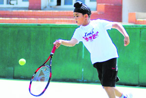 Harteshwar in action during a tennis match in the under-10 category at the CLTA in Chandigarh on Saturday.