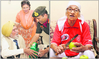 An Army officer honours centenarian veteran Col Kartar Singh (retd); and right Mann Kaur.