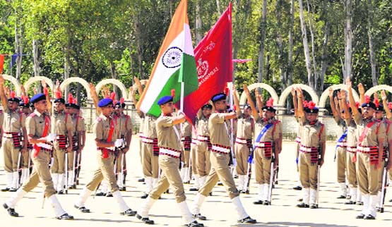 Recruits take oath after the passing-out parade at the Haryana Police Academy, Madhuban, on Saturday. Tribune photo by Ravi Kumar