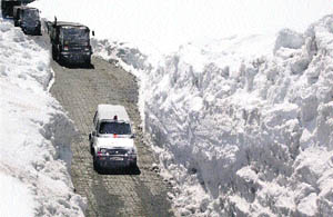 Vehicles being driven along the Srinagar-Leh national highway after it was reopened to traffic on Saturday.