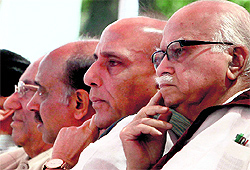 Rajnath Singh with LK Advani and Delhi BJP chief Vijay Goel at the partys Sthapana Diwas programme in New Delhi