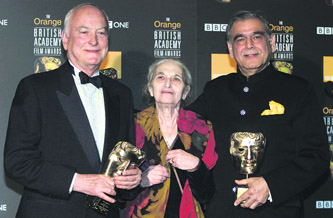 James Ivory, Ruth Prawer Jhabvala and Ismail Merchant, who together formed Merchant Ivory Productions, after receiving a British Academy film fellowship at a ceremony in Central London, in this 2002 file photo.