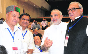 Chief Ministers Bhupinder Singh Hooda (Haryana), Narendra Modi (Gujarat), Jagadish Shettar (Karnataka) and Virbhadra Singh (Himachal Pradesh) at Vigyan Bhawan in New Delhi on Sunday.