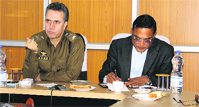 Divisional Commissioner, Kashmir, Shalinder Kumar, flanked by IGP (Kashmir Zone) Abdul Ghani Mir addresses civil and police officers via video conference in Srinagar on Sunday.