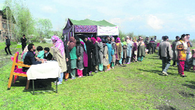 Patients lined up for their turn at a health camp held in Saida Kadal.