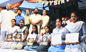 Meritorious girls from different schools, who were given scholarships under the Shakti mission at SVM School in Ludhiana on Sunday.