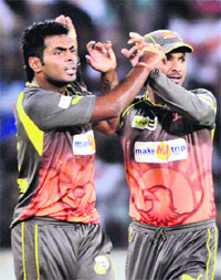 Hanuman Vihari celebrates with Kumara Sangakkara on Sunday.
