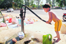 Pumping it up A boy fills water from a handpump in Bathinda. With the temperature rising, demand for water is also likely to go up in the city putting pressure on the civic body.