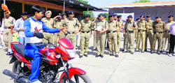 A live demonstration on how to ride a two-wheeler safely underway at the road safety camp in Abohar on Monday.