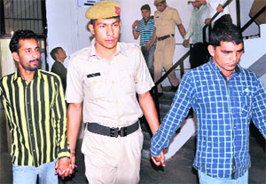 Accused in the Jyoti murder case being produced in a court at Panchkula on Monday