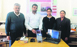 Dr CC Tripathi, Associate Prof, ECE, Dr Swati Dahiya, Associate Professor, Biotech, and Sanjeev Bhardwaj and Neha Sharma, students, with the newly invented instrument.