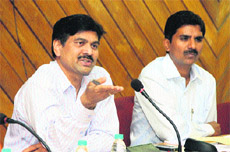 Principal Secretary, Governance Reforms, C Roul, interacts with officials of Doaba and Majha districts during a meeting on e-governance in Jalandhar on Monday. 