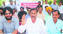Members of Public Health Engineering Employees Welfare Association address mediapersons in Jammu on Monday. A Tribune photograph