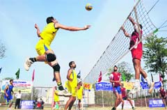 Spikers in action during the final of State Volleyball Championship at MA Stadium in Jammu on Monday. Tribune Photo: Inderjeet Singh