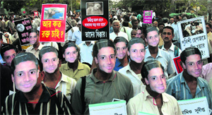 Pensioners take part in a rally to register their protest against the police role in the death of SFI leader Sudipta Gupta, in Kolkata on Sunday.