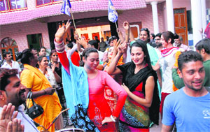 Eunuchs dance at the residence of Rajni Rawat, BSP candidate for the post of Mayor, in Dehradun on Tuesday. 