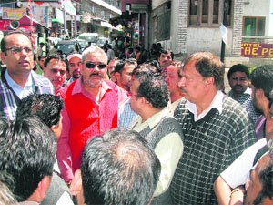 Politicians hound Garhwal Jal Sansthan officials over the overflowing sewage in Mussoorie on Tuesday.