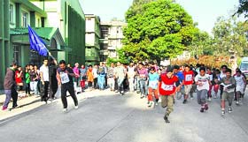 Students and faculty members of Dr RP Government Medical College participate in the run for fun event in Tanda