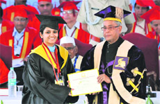President Pranab Mukherjee confers a gold medal on a student during the 10th convocation of the National Institute of Technology, Kurukshetra, on Tuesday.
