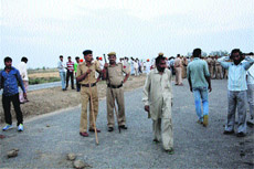The police deployed outside an ashram in Karontha village near Rohtak on Monday. 