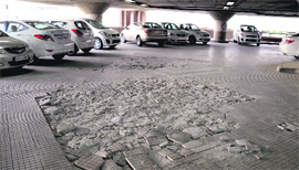 Broken tiles greet motorists at a multi-level parking of the MC near Mata Rani Chowk in Ludhiana.