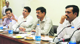 Rakesh Singh, Chief Secretary (extreme right), chairs a meeting at the Circuit House in Ludhiana on Tuesday.