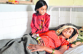 Seema, with her only surviving daughter Sonia, under treatment at Lord Mahavir Civil Hospital, Ludhiana.