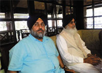 Chief Minister Parkash Singh Badal and his deputy Sukhbir Badal interacting with the media at a restaurant at Taj Holiday village in Goa on Tuesday.
