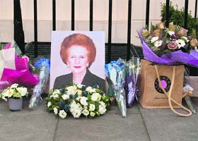 Flowers outside the home of former British PM Margaret Thatcher in London on Monday